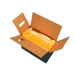 clear plastic bag of blended popping oil inside cardboard box