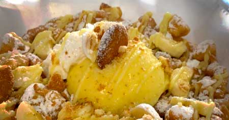 Funnel Cake with Whip cream, Bananna Pudding and Graham Cracker cookies as toppings.