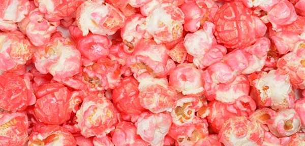 close up photo of bright pink cotton candy popcorn