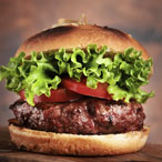 Photo of a hamburger on a brown background