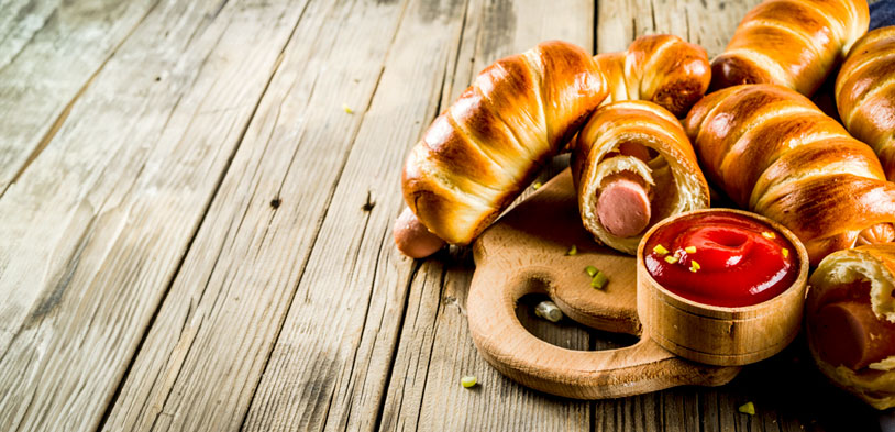 Pretzel wrapped hot dogs
