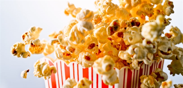 popcorn bouncing out of bucket going everywhere