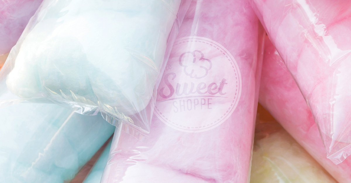 jumbo clear bags with individual servings of lime green, light blue, and light pink cotton candy