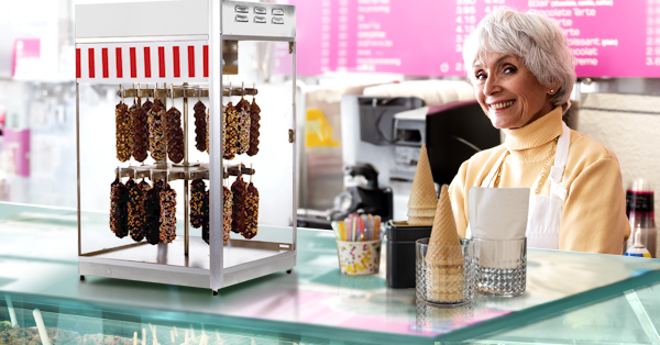 Fudge Puppy Display Case by Gold Medal Products Co in an Ice cream shop.