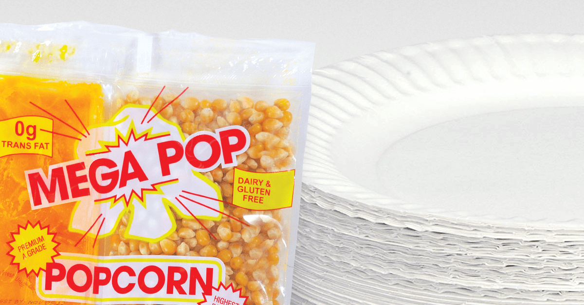 mega pop corn, oil, and butter-flavor seasoning popcorn kit next to a large stack of white paper pates mega pop corn, oil, and butter-flavor seasoning popcorn kit next to a large stack of white paper pates