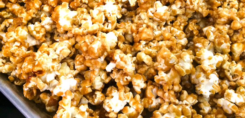 caramel corn on a sheet pan