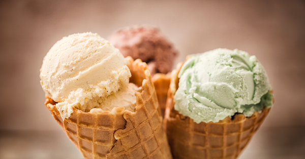 three cones of ice cream on waffle cones